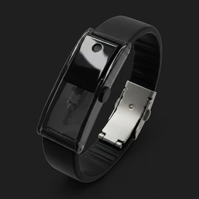 Baswick black refillable perfume bracelet with sprayer button and buckle clasp on dark background.