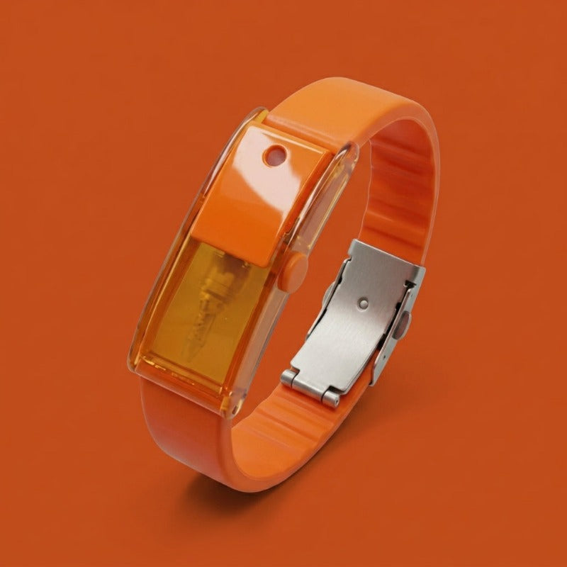 Baswick orange refillable perfume bracelet with visible fragrance reservoir on orange background.