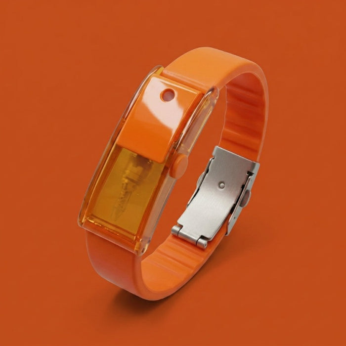 Baswick orange refillable perfume bracelet with visible fragrance reservoir on orange background.