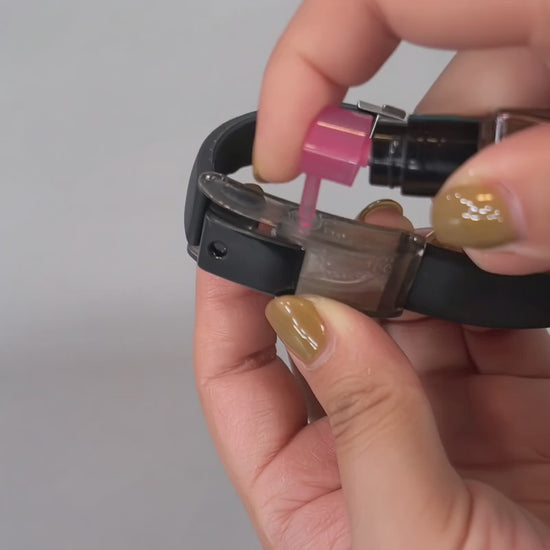 Video demonstrating how to refill the Baswick black perfume bracelet reservoir using a dropper.
