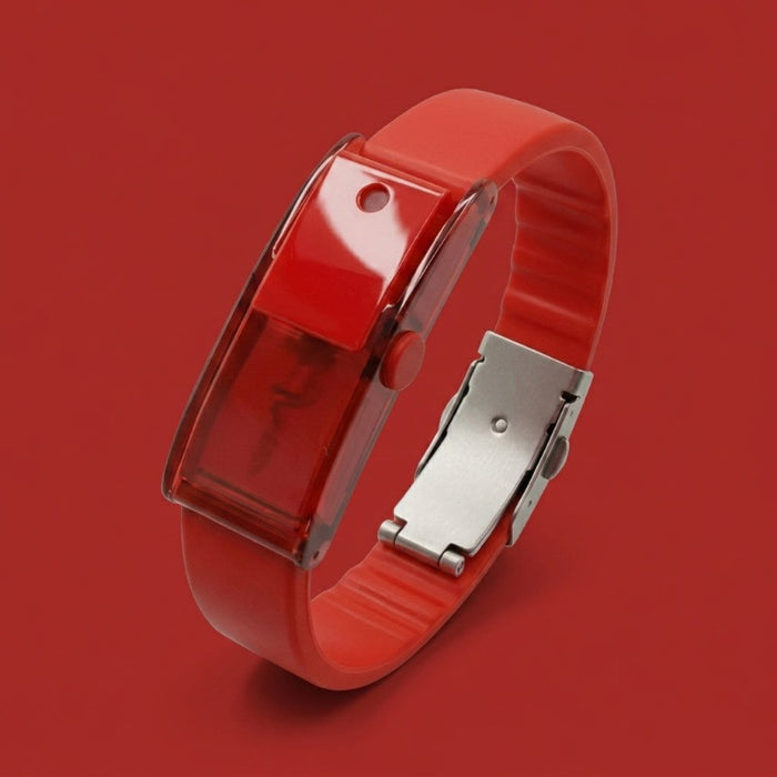 Baswick red refillable perfume bracelet with sprayer button and buckle clasp on red background.
