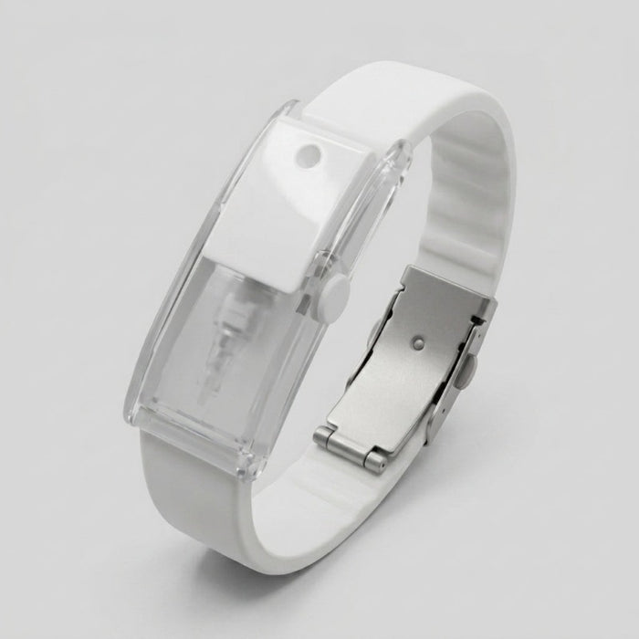 Baswick white refillable perfume bracelet with sprayer button and buckle clasp on light background.